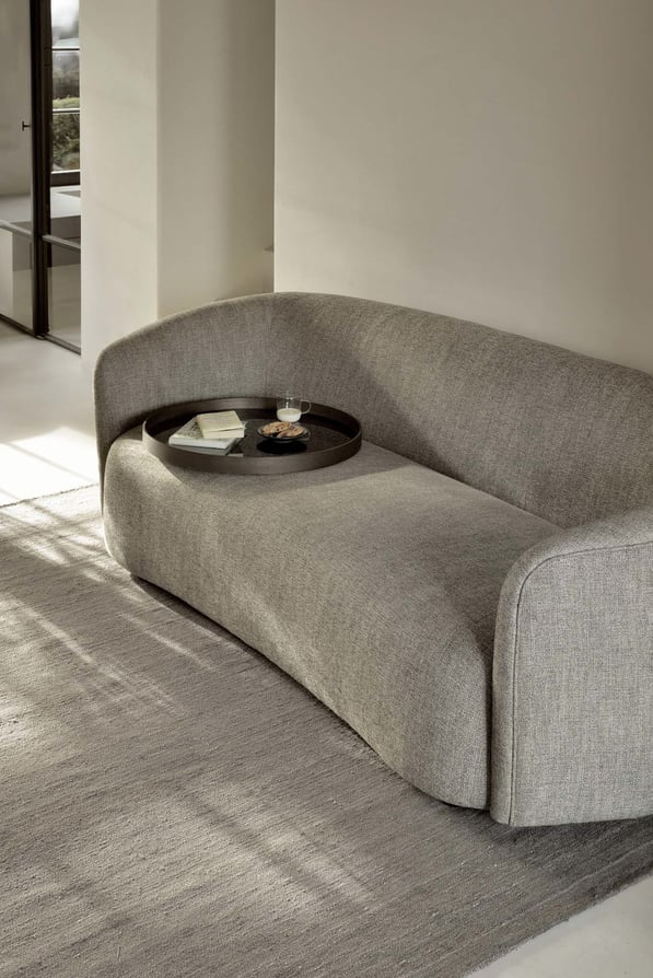 Ellipse sofa with tray of Ethnicraft